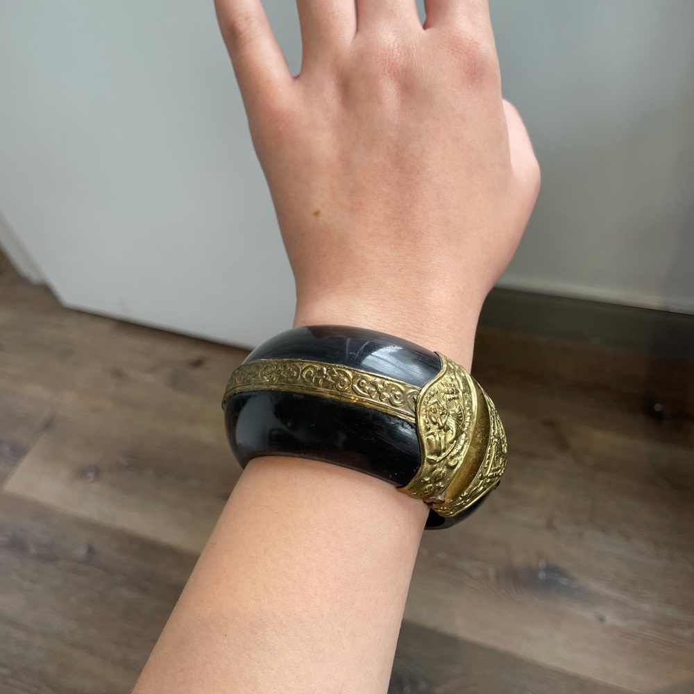 Vintage hand carved bone bangle